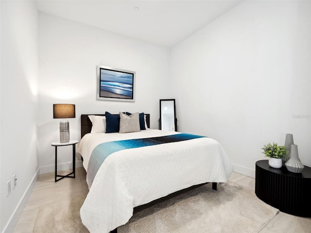 bedroom featuring light hardwood / wood-style flooring