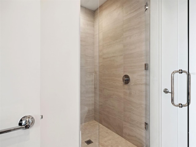 bathroom featuring an enclosed shower