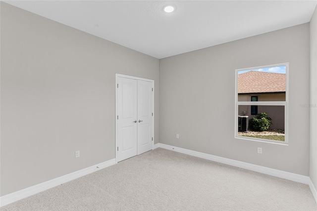 empty room with carpet floors