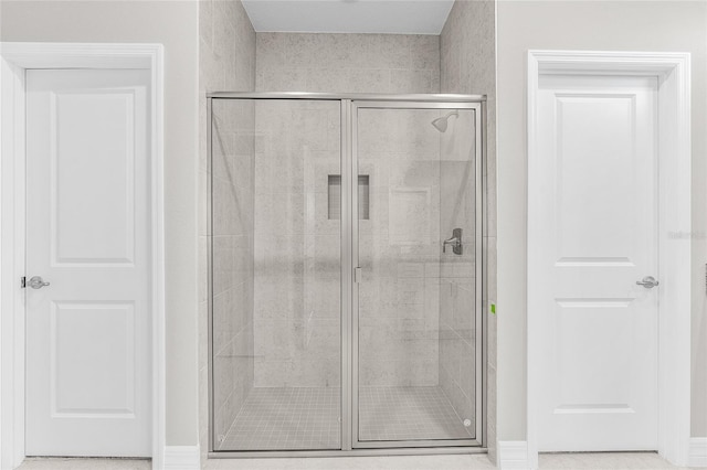 bathroom with an enclosed shower