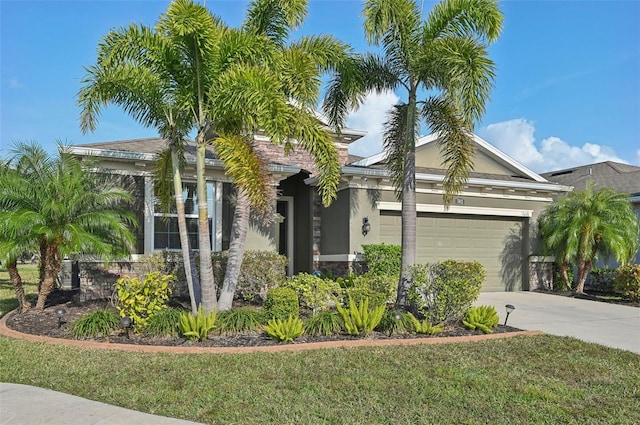 view of front facade featuring a garage and a front yard