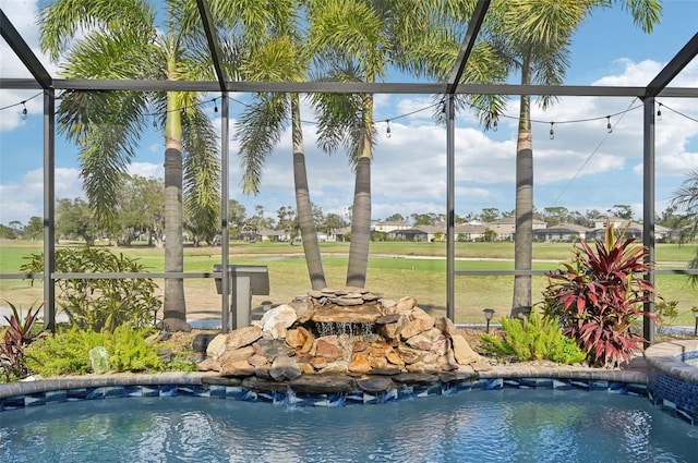 view of pool with a lanai