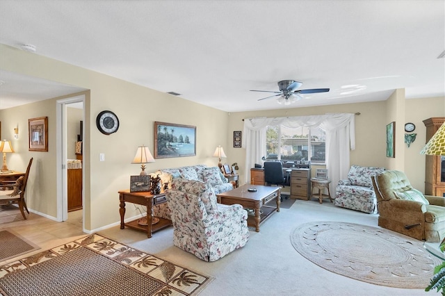 living room with light colored carpet and ceiling fan