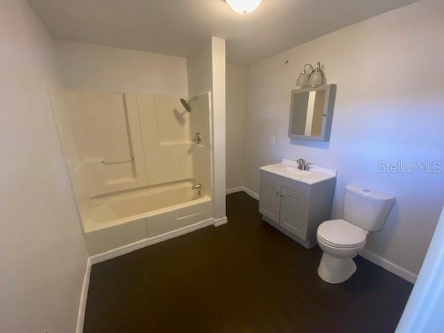 full bathroom featuring vanity, toilet, and shower / bath combination