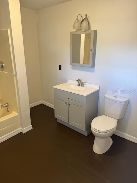 full bathroom featuring wood-type flooring, vanity, shower / bathtub combination, and toilet