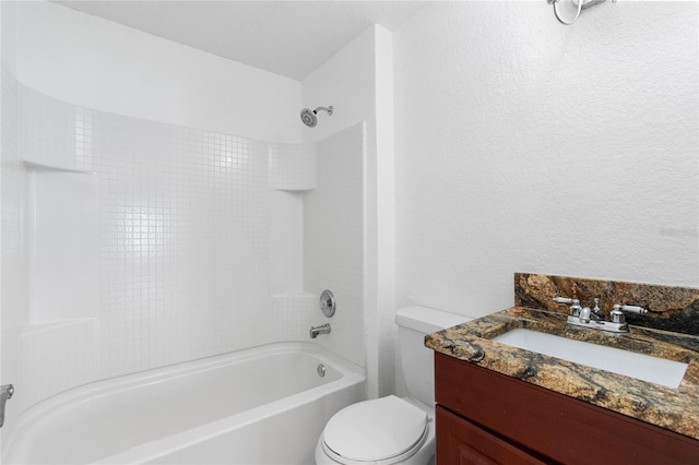 full bathroom with vanity, bathing tub / shower combination, and toilet