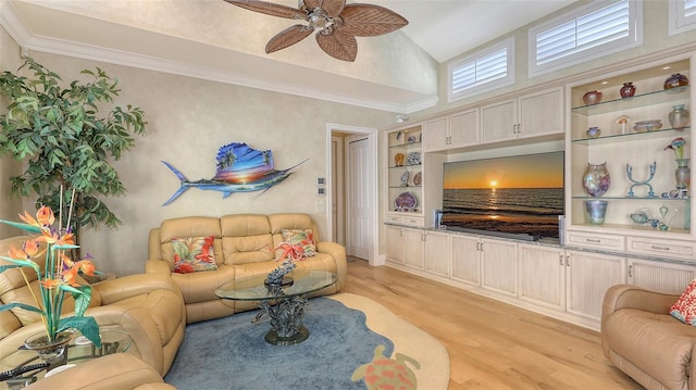 living room featuring ornamental molding, ceiling fan, built in features, and light wood-type flooring