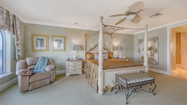 carpeted bedroom featuring ornamental molding and ceiling fan