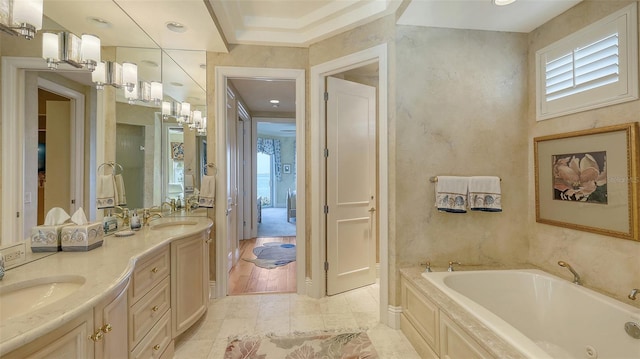 bathroom featuring vanity and a bathtub