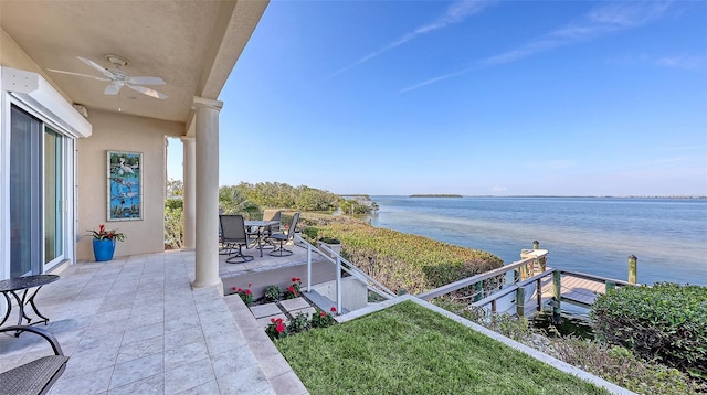 water view with a patio and ceiling fan