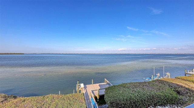 view of dock with a water view