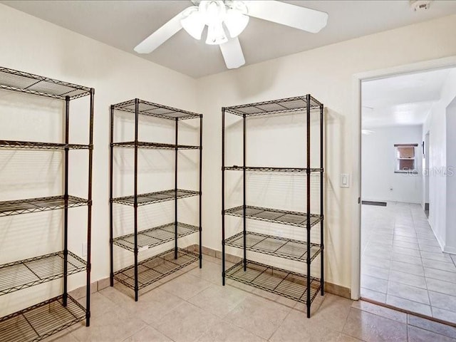 storage room featuring ceiling fan