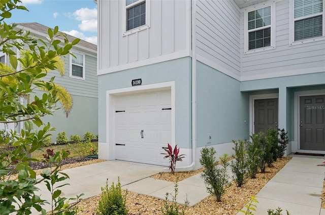 entrance to property featuring a garage