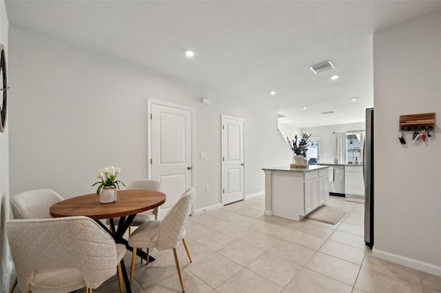 view of tiled dining area