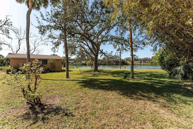 view of yard with a water view