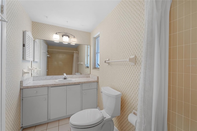 bathroom with tile patterned flooring, vanity, toilet, and a shower with curtain