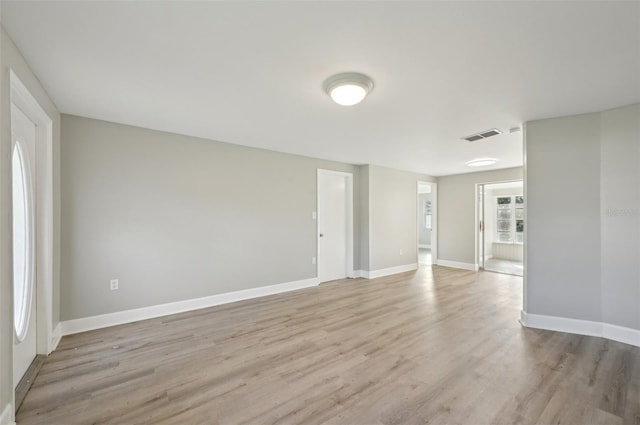 empty room featuring light hardwood / wood-style floors