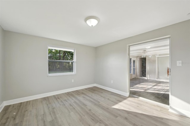 empty room with light wood-type flooring