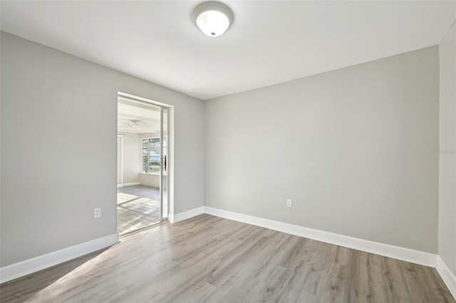 empty room with wood-type flooring