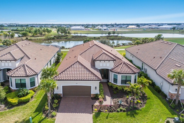 bird's eye view with a water view