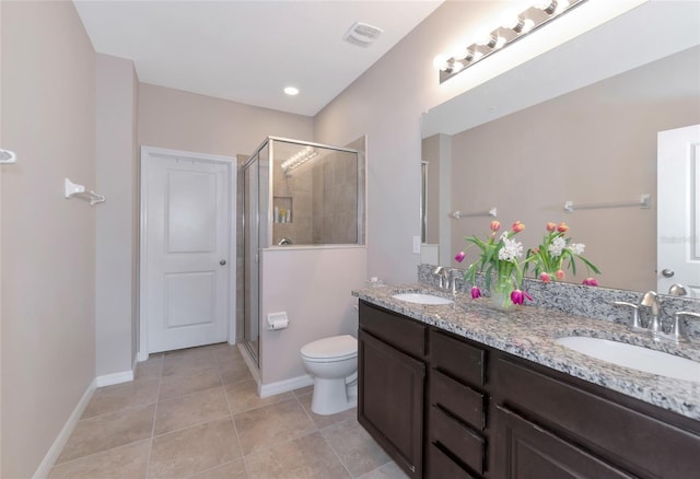 bathroom with walk in shower, tile patterned floors, toilet, and vanity