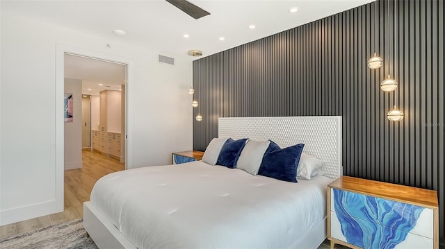 bedroom with light wood-type flooring