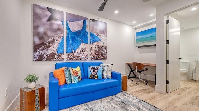 sitting room featuring hardwood / wood-style floors