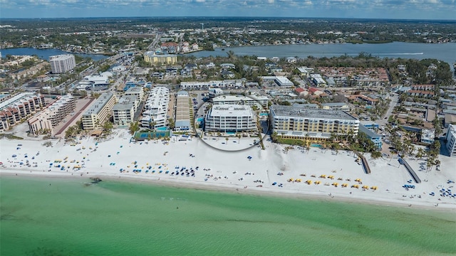 birds eye view of property featuring a water view and a view of the beach