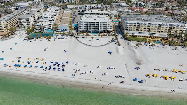 aerial view featuring a water view and a view of the beach