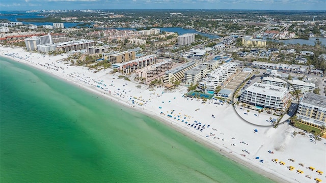 aerial view featuring a view of the beach and a water view