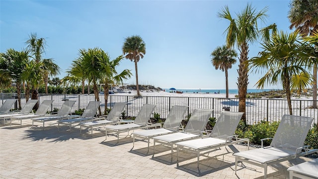 view of patio with a water view