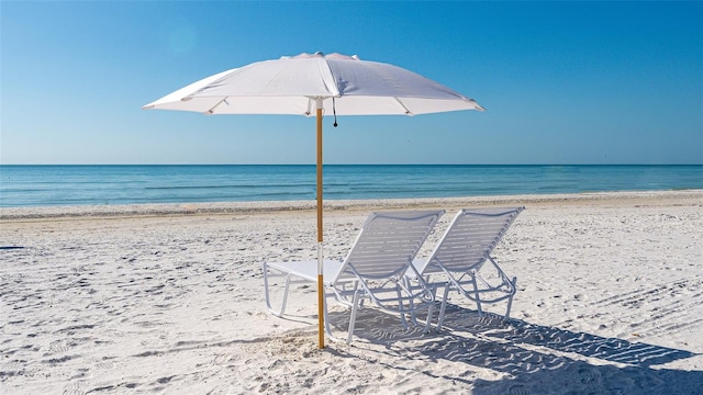 view of water feature with a beach view