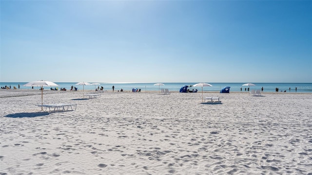 property view of water featuring a beach view