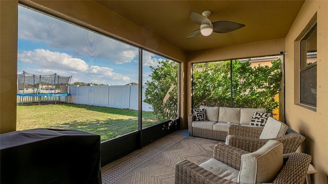 sunroom / solarium with ceiling fan