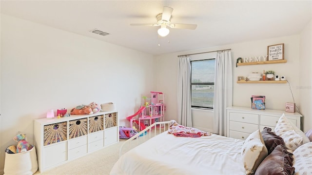 carpeted bedroom featuring ceiling fan