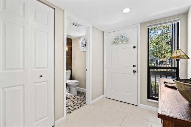 entrance foyer with light tile patterned flooring