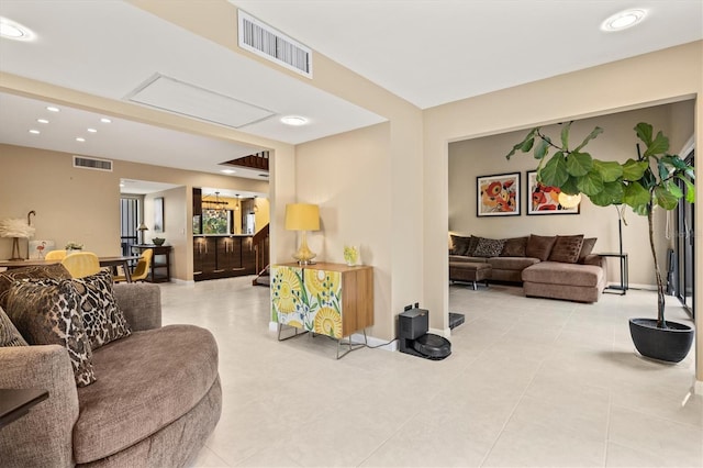 living room with light tile patterned floors