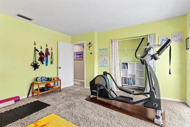 workout area with carpet floors