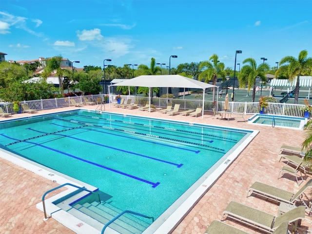 view of pool featuring a patio area