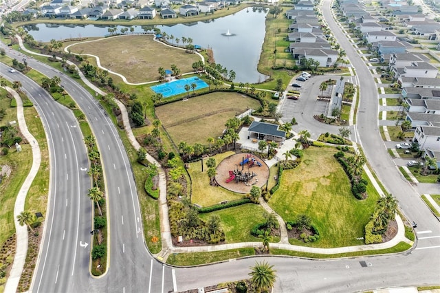 aerial view featuring a water view and a residential view