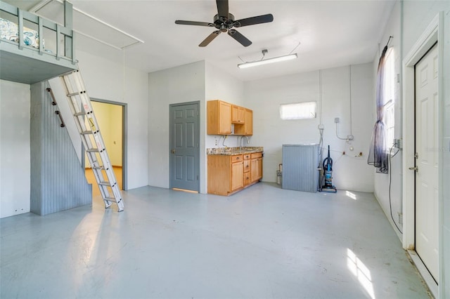 garage featuring ceiling fan