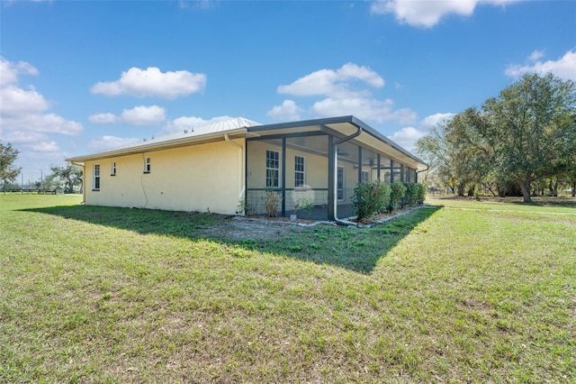 view of home's exterior featuring a lawn