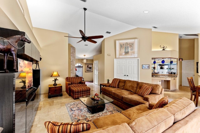 living room featuring ceiling fan and high vaulted ceiling