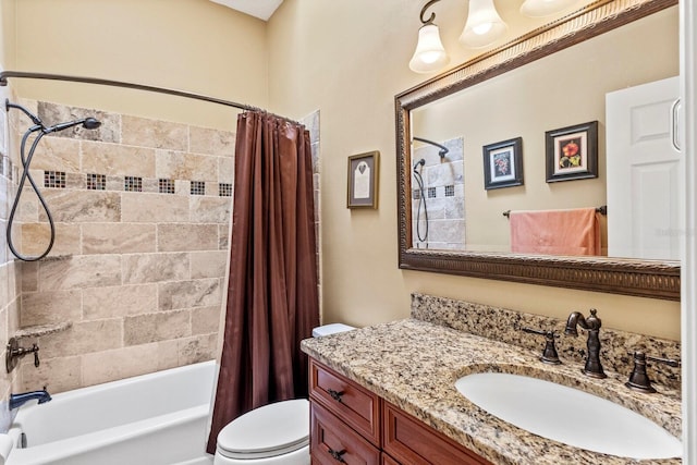 full bathroom with vanity, toilet, and shower / bath combo with shower curtain