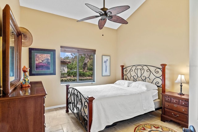 bedroom with vaulted ceiling and ceiling fan