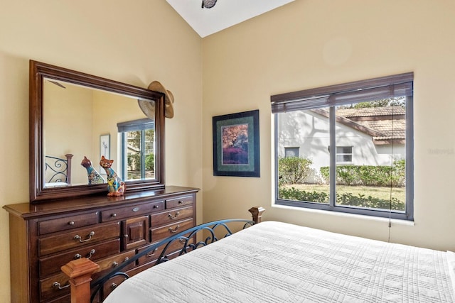 bedroom featuring vaulted ceiling