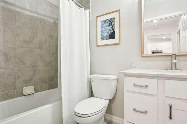 full bathroom featuring vanity, toilet, and shower / bath combo with shower curtain