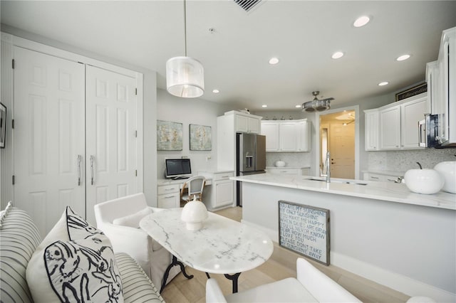 dining room featuring sink