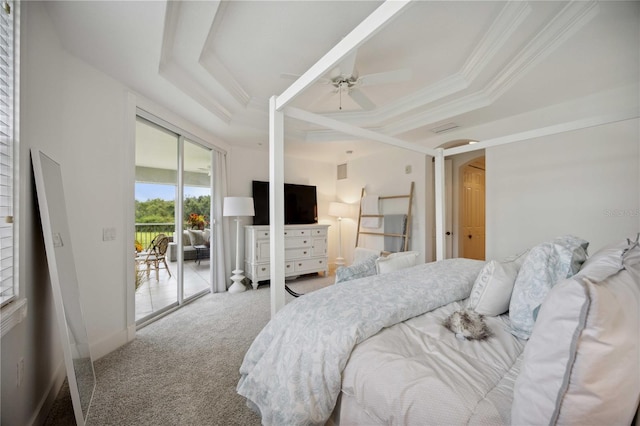 carpeted bedroom with crown molding, a raised ceiling, and ceiling fan