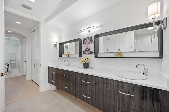 bathroom with vanity and tile patterned floors